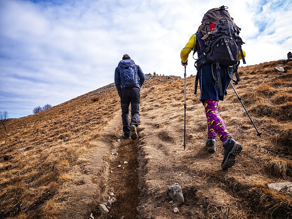 Trekking scene on Lake Como alps