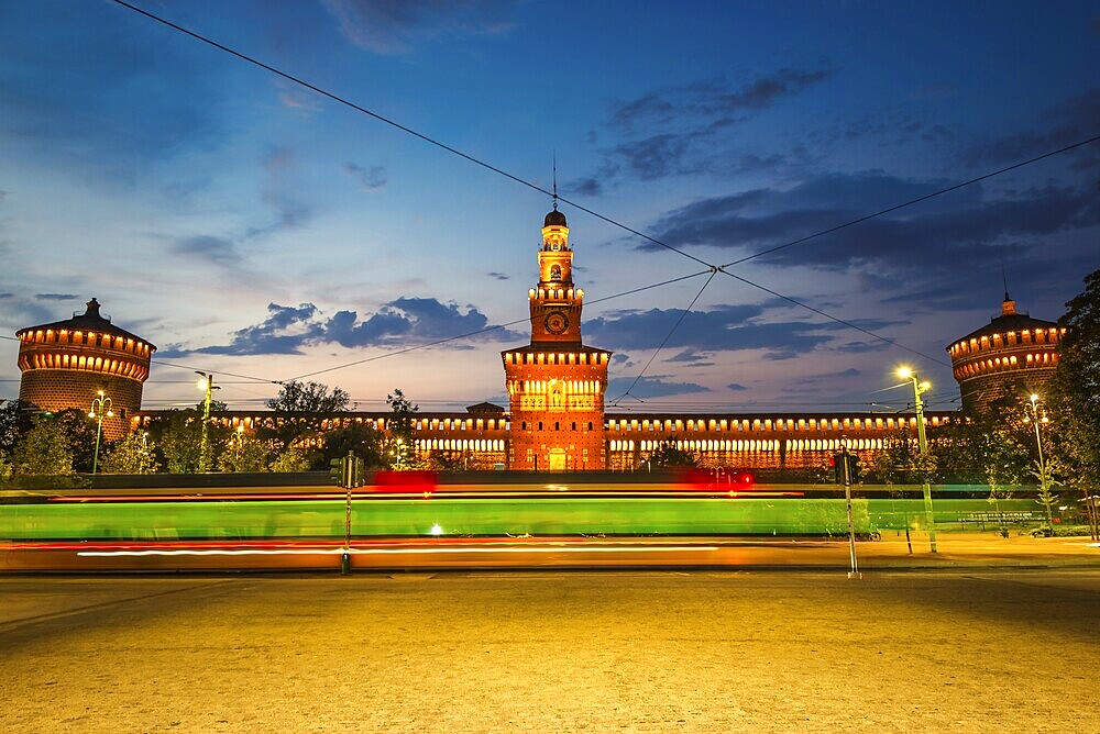 Sforzesco Castle and tram in the evening, Milan, Italy