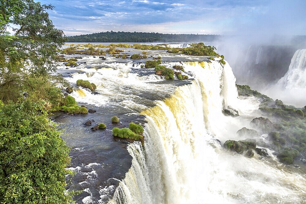 Tourists at Iguassu Falls at Iguassu National Park, World Natural Heritage Site by UNESCO