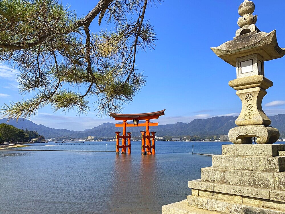 Stone lamp at the seaside close to Floating Torii gate, Hatsukaichi, Hiroshima, Japan