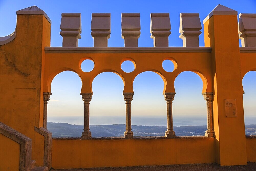 Pena castle yellow arch at sunset in Sintra, Portugal