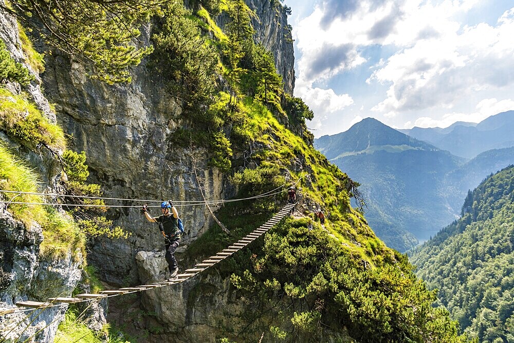 Sports via ferrata near the valley with a suspension bridge and a great view of the Berchtesgaden mountains