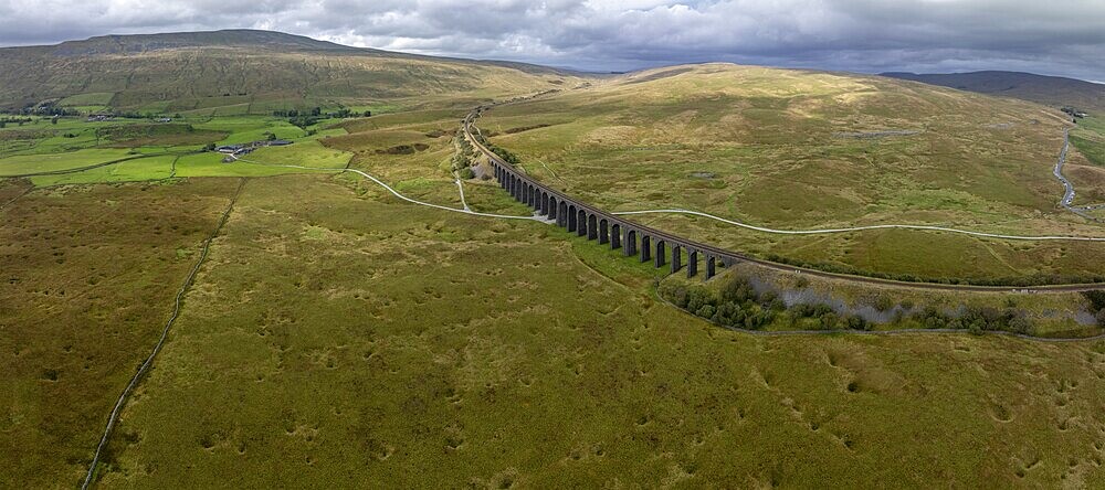 Ribblehead Viaduct, railway viaduct in the Yorkshire Dales, behind Whernside mountain, drone shot, Carnforth, England, Great Britain