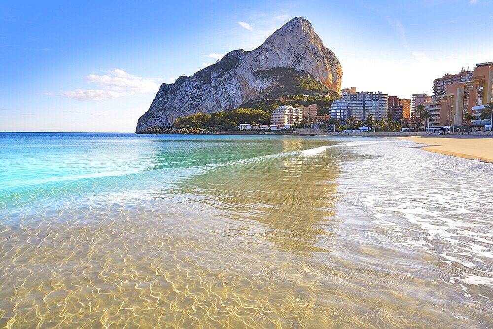 Playa de Fossa beach in Calpe and Ifach penon rock of Alicante in Spain