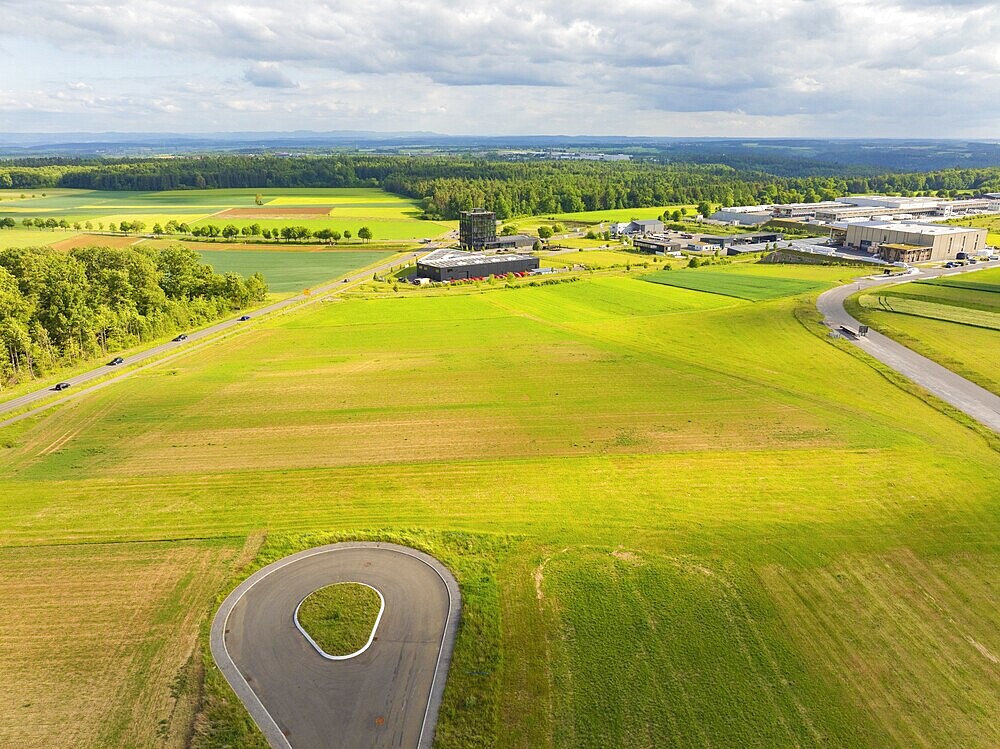 Wide green fields with a country road and surrounding rural landscape, ING Park development area, Zweckverband INGpark Nagold Gäu, Nagold, Germany