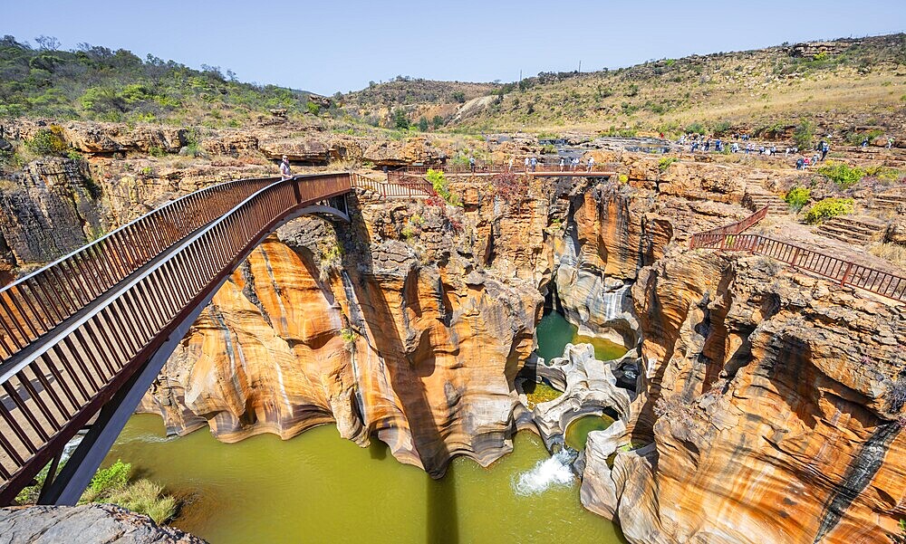 Bridges over a canyon with steep orange-coloured cliffs and the Blyde River, Bourke's Luck Potholes, Panorama Route, Mpumalanga, South Africa