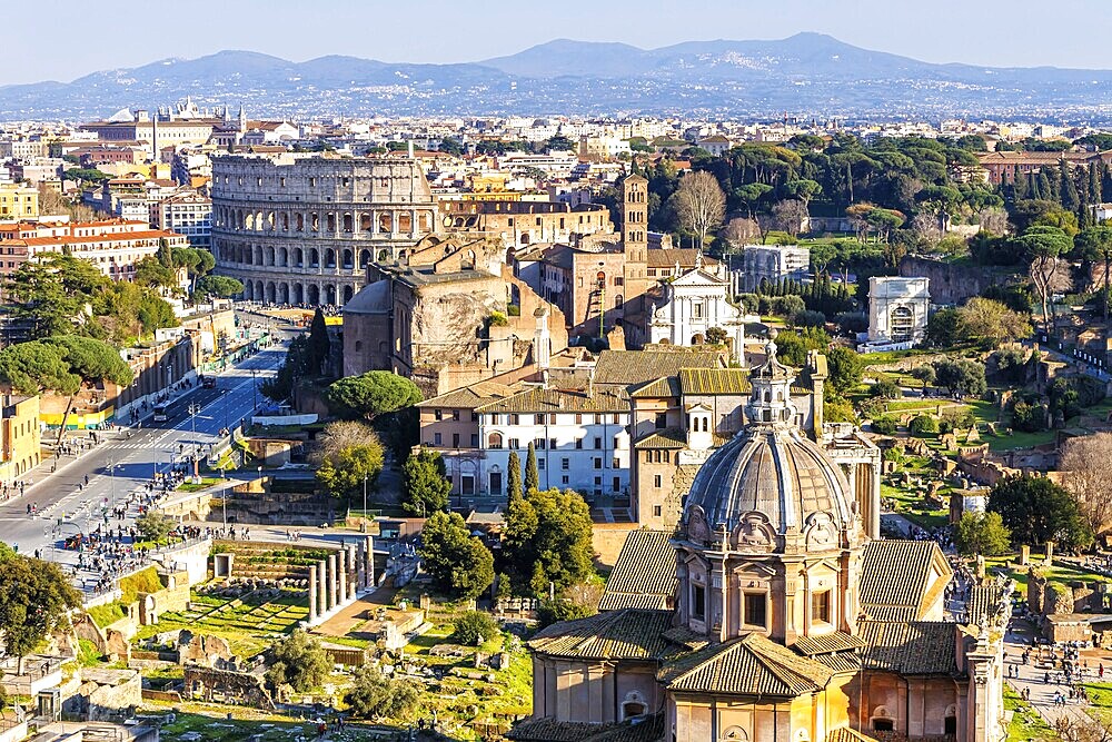 Forum Skyline Romanum and Colosseum ancient historical temple ruins from above in Rome, Italy