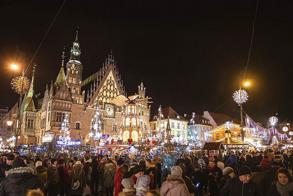 WROCLAW, POLAND - DECEMBER 09, 2018: Christmas fair in the market square of Wroclaw a part on front of city hall