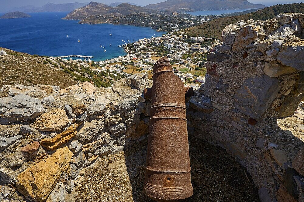 Old cannon on ruins overlooking the sea and surrounding landscape of hills, Pandeli Castle, Castle, Leros Fortress, St John's Fortress, Apitiki Hill, Pandeli Bay, Agia Marina, Leros, Dodecanese, Greek Islands, Greece
