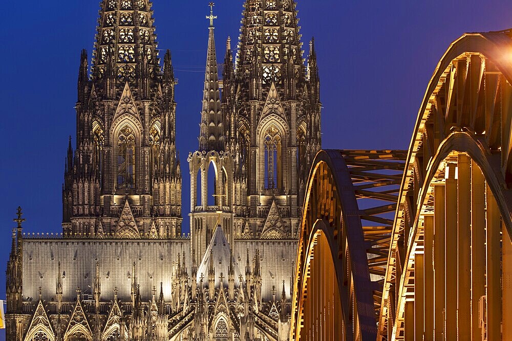 Cologne Cathedral and the Hohenzollern Bridge illuminated with LED lights, Cologne, North Rhine-Westphalia, Germany