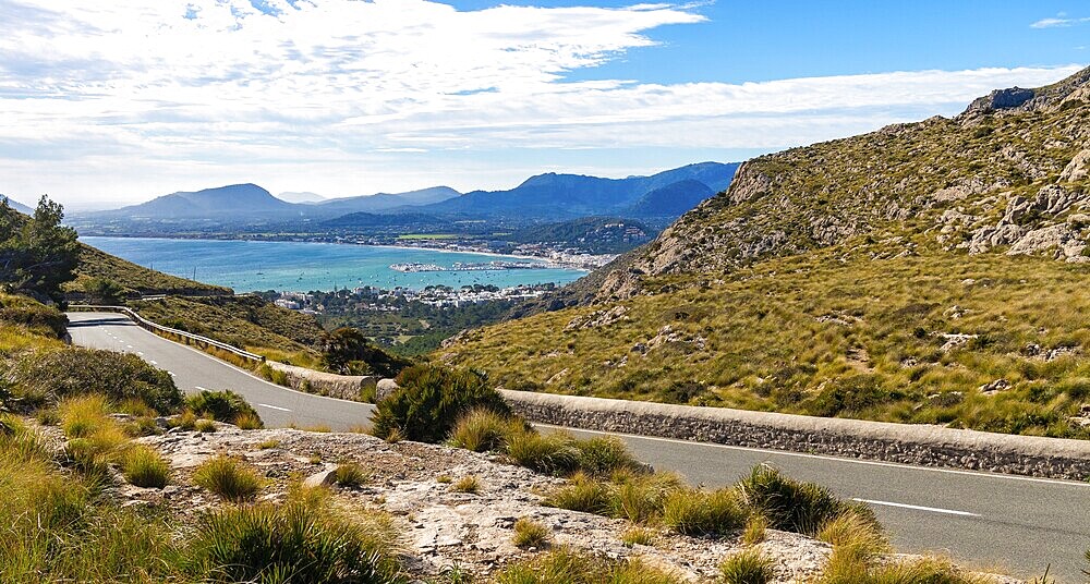 A road among the mountains on the Formentor peninsula in Mallorca. In the background the sea and mountains