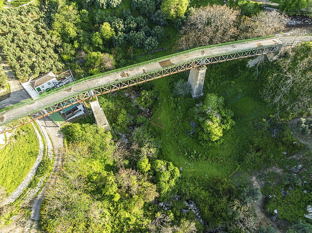 Cycle path Via Verde Del Aceite, old railroad track leading over a bridge, at village Zuheros, Andalusia, Spain