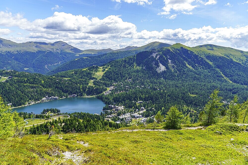 View of an expansive mountain landscape with a lake in the valley, bad kleinkirchheim, carinthia, austria