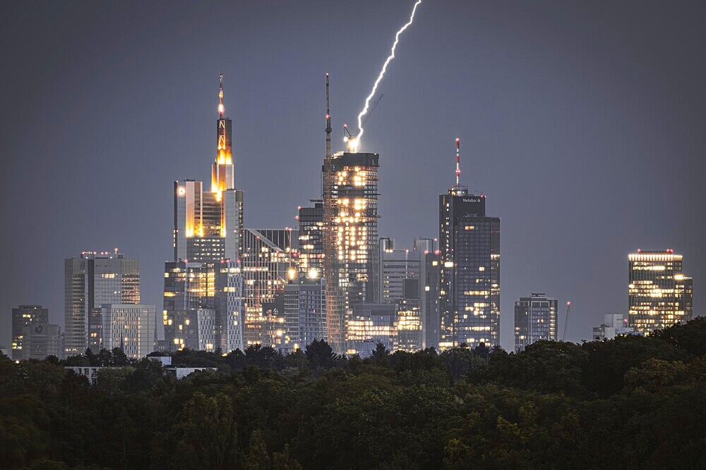 Lightning strikes over Frankfurt, force of nature in the centre of the city. City centre of Frankfurt am Main, Hesse, Germany