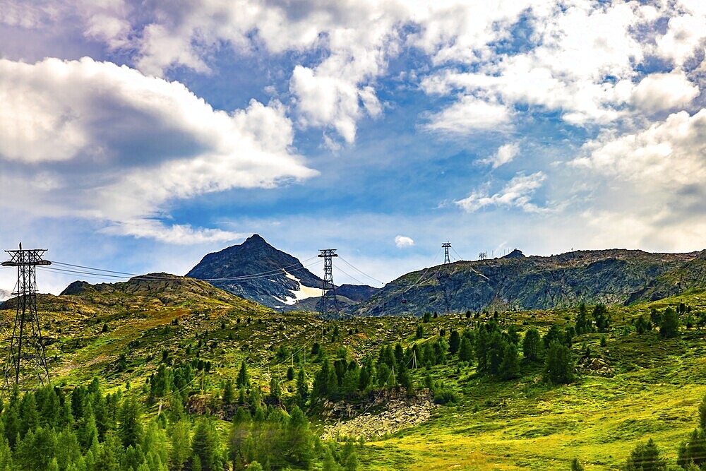 Overhead Cable Car with Mountain View in the Swiss Alps in a Sunny Summer Day in Bernina, Valposchiavo, Pontresina, Grisons, Switzerland
