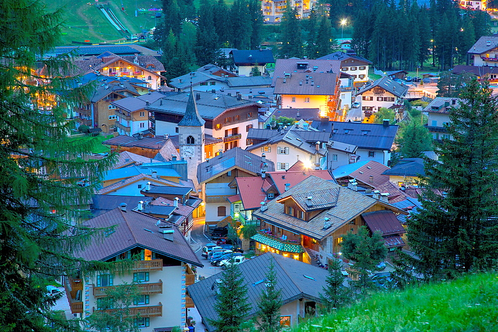 View over town at dusk, Canazei, Val di Fassa, Trentino-Alto Adige, Italy, Europe