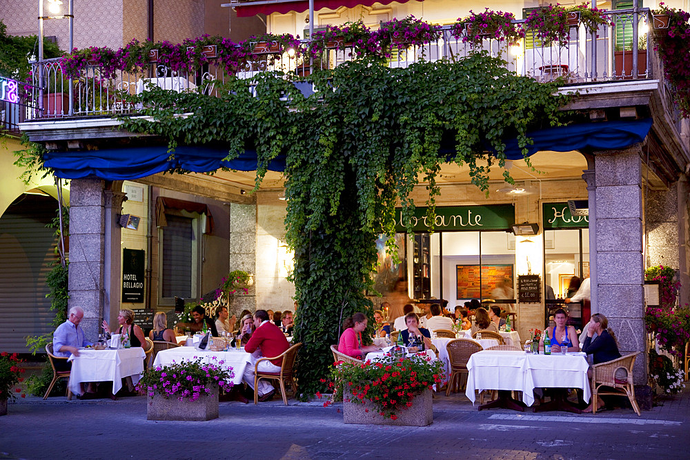 Town restaurant at dusk, Bellagio, Lake Como, Lombardy, Italy, Europe