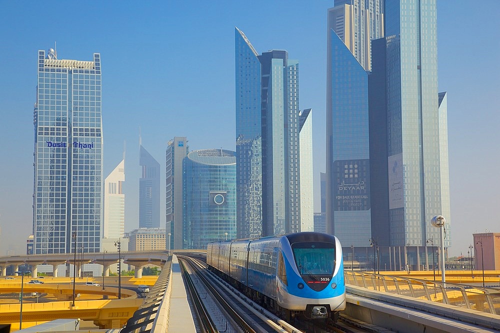 Metro and skyscrapers on skyline, Dubai, United Arab Emirates, Middle East