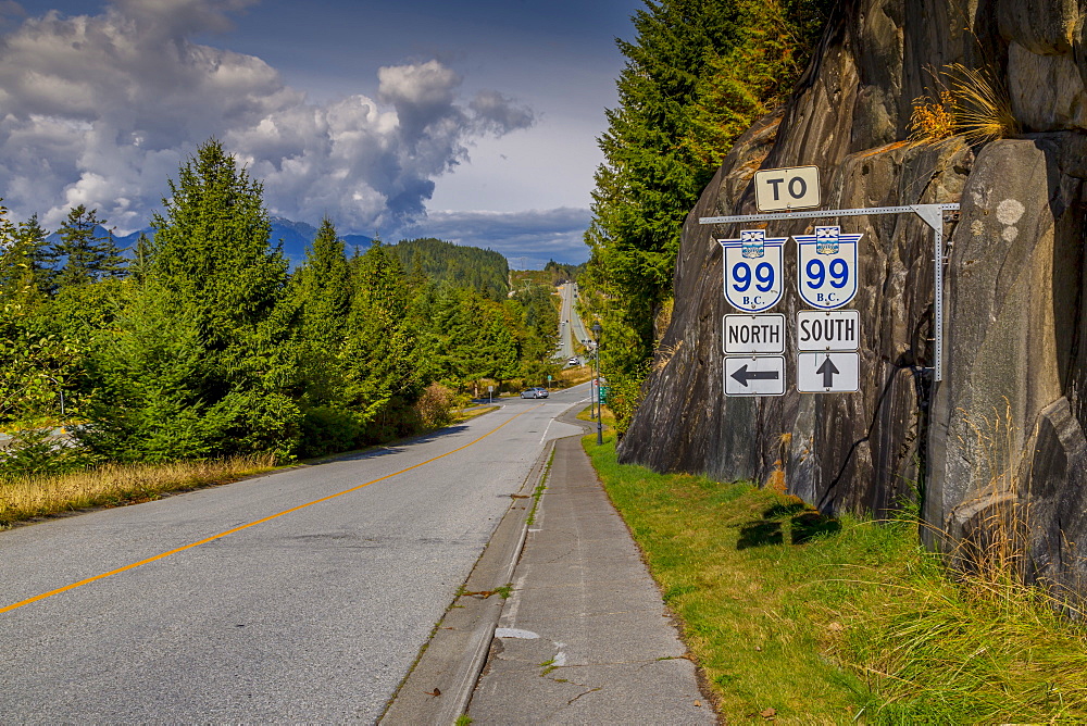 View of The Sea to Sky Highway and signpost near Squamish, British Columbia, Canada, North America