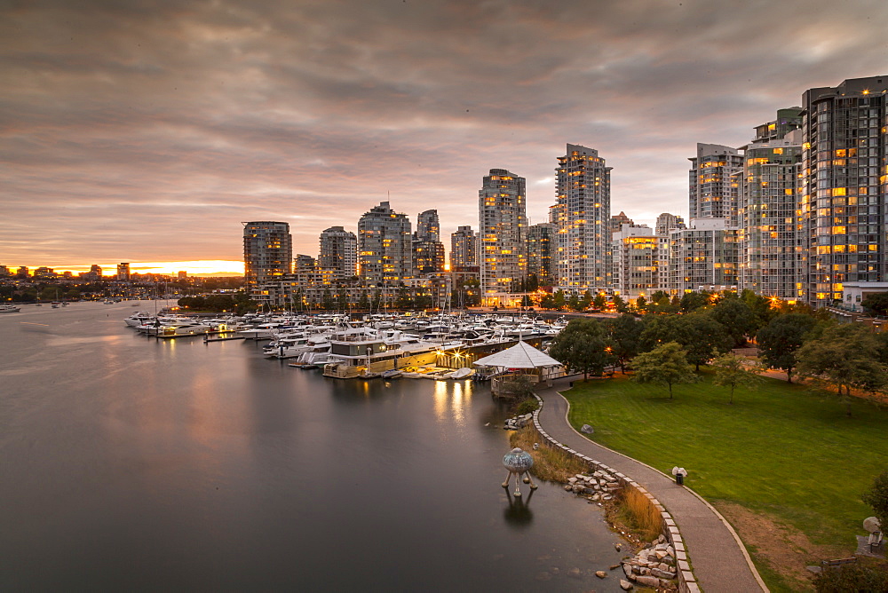 View of Vancouver skyline and yellow taxi on Cambie Street Bridge, Vancouver, British Columbia, Canada, North America