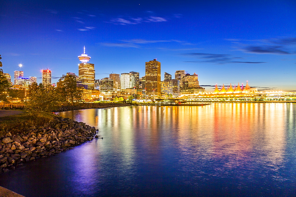 View of city skyline and Vancouver Lookout Tower from CRAB Park at Portside, Vancouver, British Columbia, Canada, North America