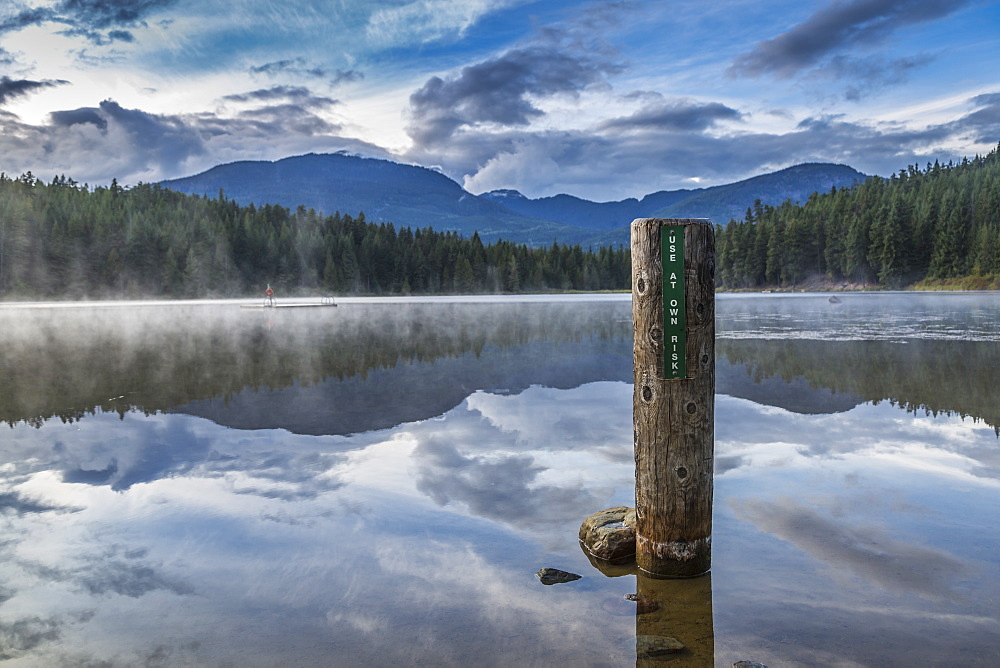 Mist on Lost Lake, Ski Hill and surrounding forest, Whistler, British Columbia, Canada, North America