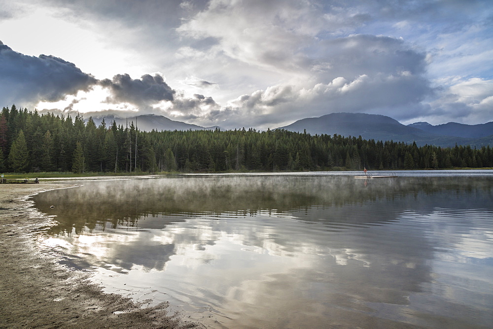 Mist on Lost Lake, Ski Hill and surrounding forest, Whistler, British Columbia, Canada, North America