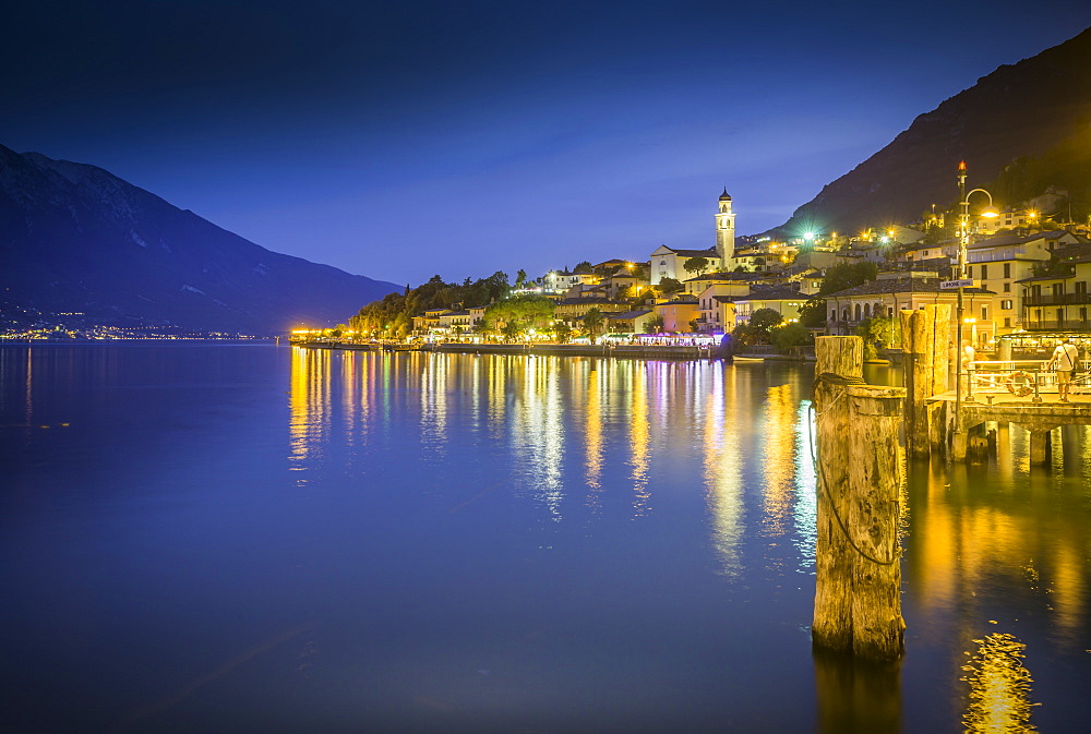 Panoramic view of Lake Garda and the port of Limone at dusk, Lake Garda, Lombardy, Italian Lakes, Italy, Europe