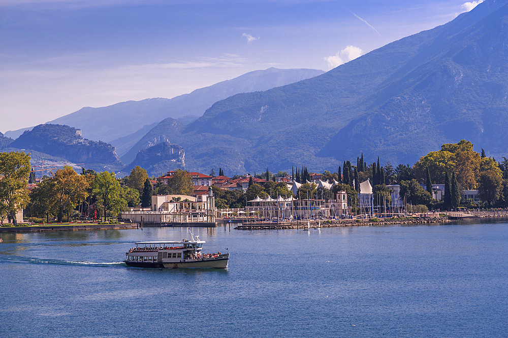 View of ferry leaving the harbour of Riva del Garda, Lake Garda, Trentino, Italian Lakes, Italy, Europe
