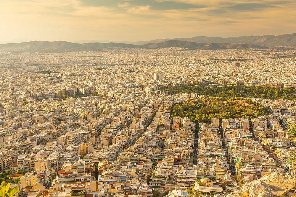 View of North Athens suburbs from Likavitos Hill in late afternoon, Athens, Greece, Europe