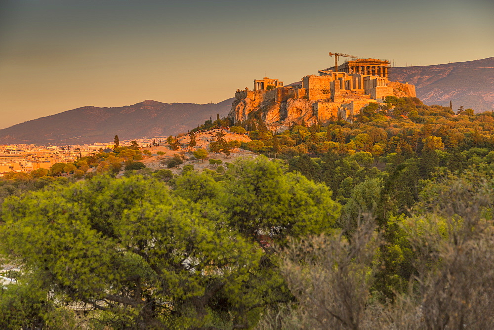 View of The Acropolis, UNESCO World Heritage Site, at sunset from Filopappou Hill, Athens, Greece, Europe