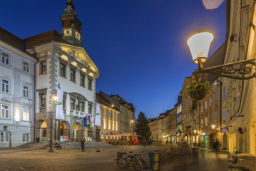 View of Town Hall and street scene at dusk, Ljubljana, Slovenia, Europe