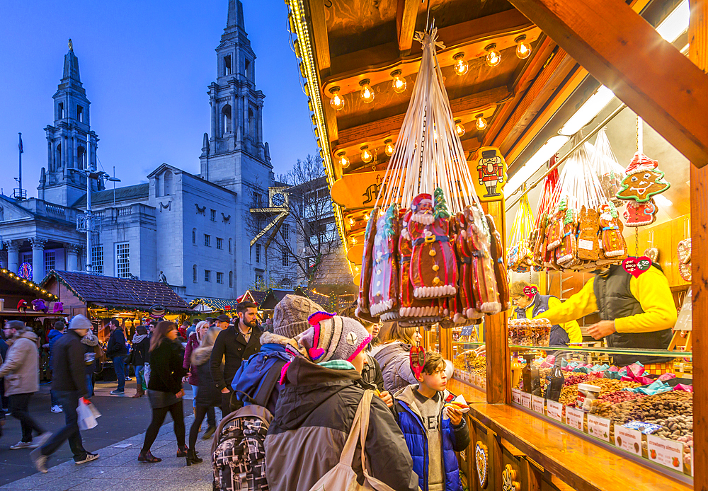 View of visitors and Christmas Market stalls at Christmas Market, Millennium Square, Leeds, Yorkshire, England, United Kingdom, Europe