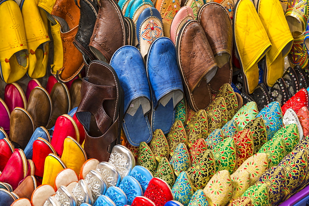 Colourful souvenir shoes for sale in the Market At Rahba Qedima, Marrakesh (Marrakech), Morocco, North Africa, Africa