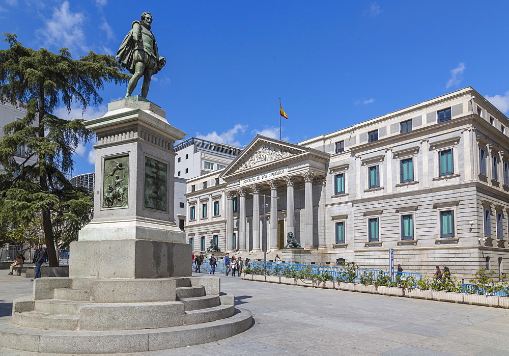 View of Michaeli de Gervantes statue and Congress in Plaza de las Cortes, Madrid, Spain, Europe