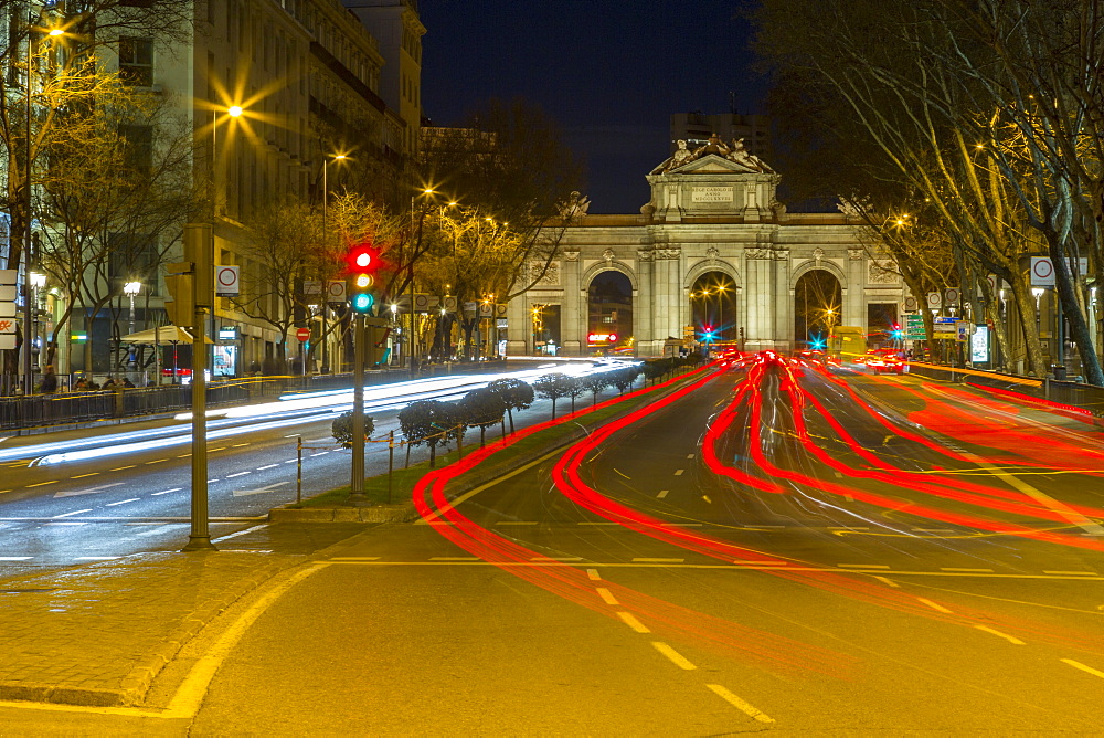 View of Triomphal Arch (Puerta de Alcala) in Plaza de la Independencia at dusk, Madrid, Spain, Europe