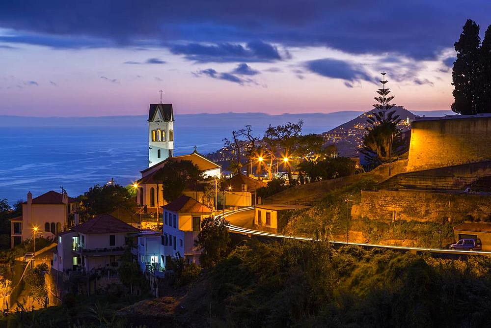 View of Church of Sao Goncalo overlooking Funchal harbour and town at dusk, Funchal, Madeira, Portugal, Atlantic, Europe