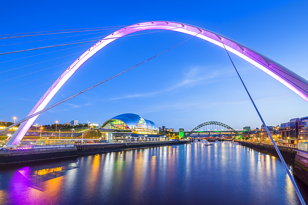 View of Tyne River and Gateshead Millennium Bridge at dusk, Newcastle-upon-Tyne, Tyne and Wear, England, United Kingdom, Europe