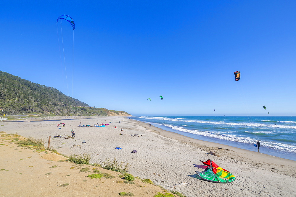 View of windsurfers on beach on Highway 1 near Davenport, California, United States of America, North America