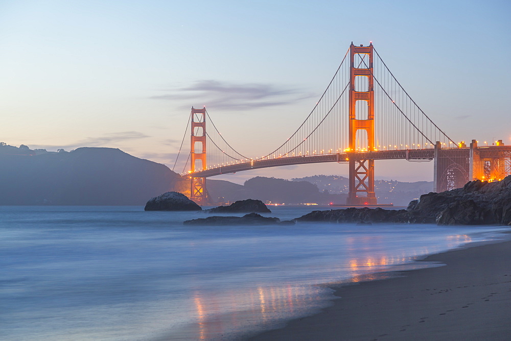 View of Golden Gate Bridge from Baker Beach at dusk, South Bay, San Francisco, California, United States of America, North America