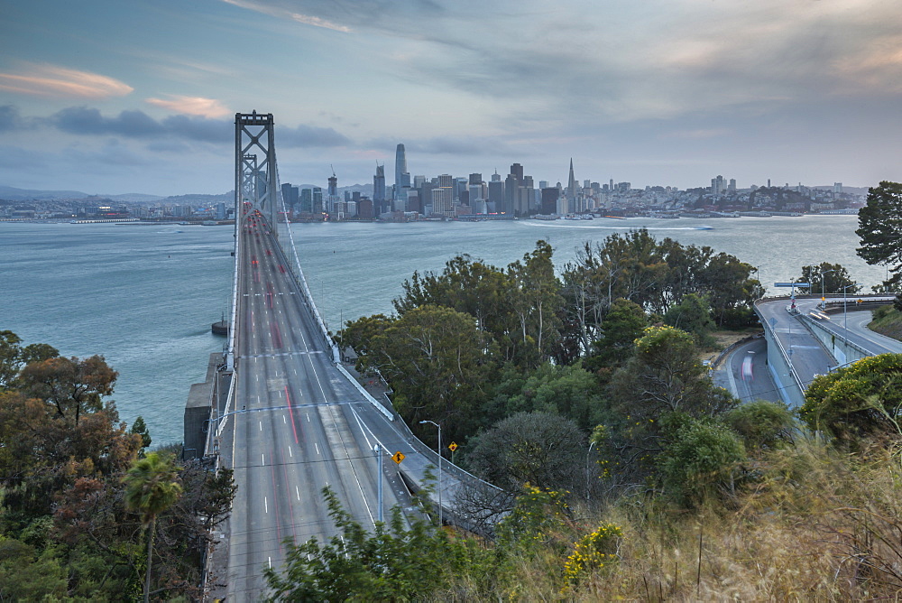 View of San Francisco skyline and Oakland Bay Bridge from Treasure Island at dusk, San Francisco, California, United States of America, North America