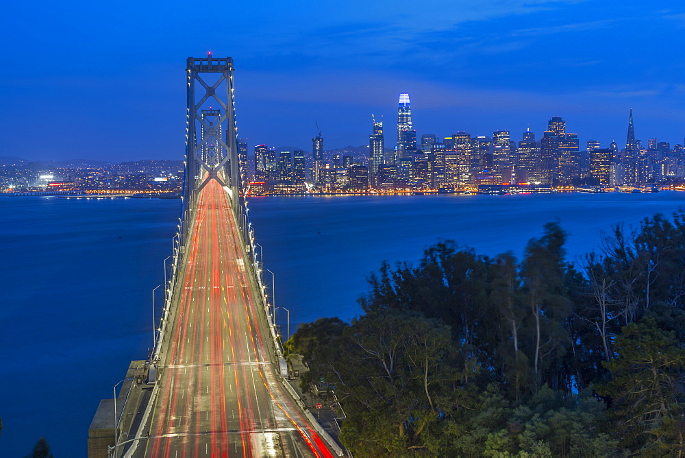 View of San Francisco skyline and Oakland Bay Bridge from Treasure Island at night, San Francisco, California, United States of America, North America