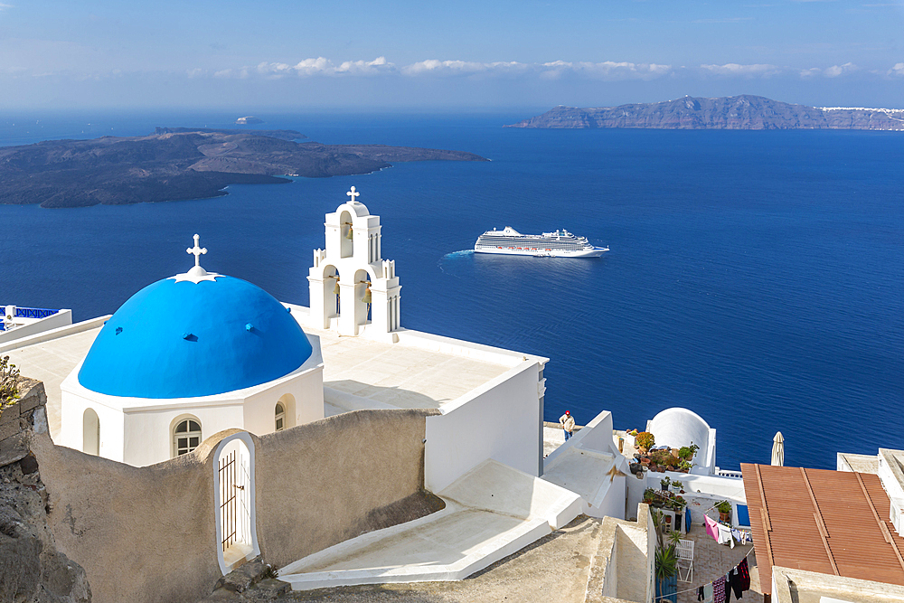 Blue dome and belltower of the church of St. Gerasimos, Firostefani, Fira, Santorini, Cyclades, Greek Islands, Greece, Europe