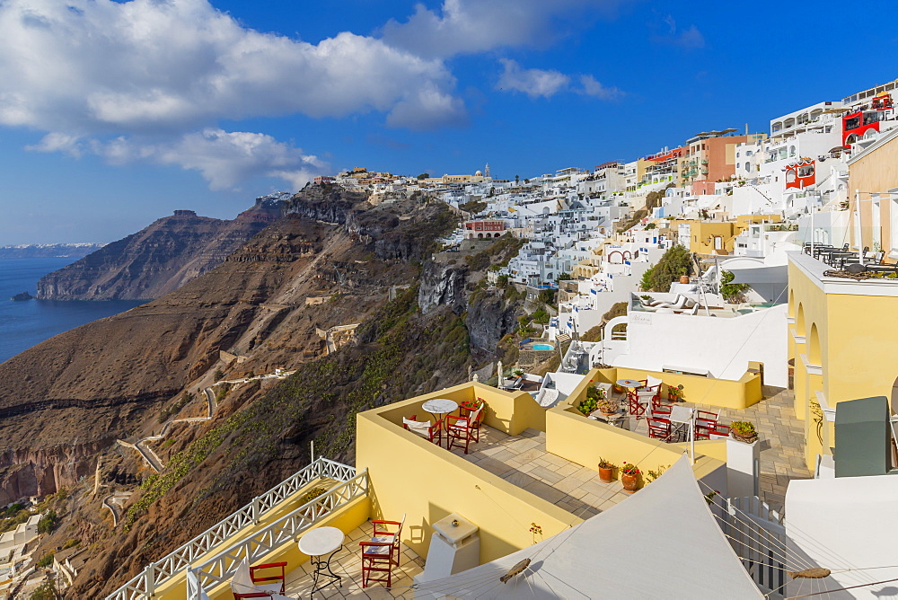 View of Fira white washed houses clinging to rocks, Firostefani, Santorini (Thira), Cyclades Islands, Greek Islands, Greece, Europe