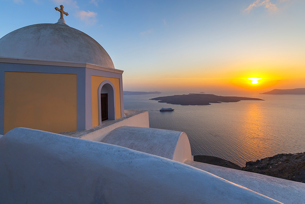 View of Greek Church of Saint Stylianos at sunset, Firostefani, Santorini (Thira), Cyclades Islands, Greek Islands, Greece, Europe