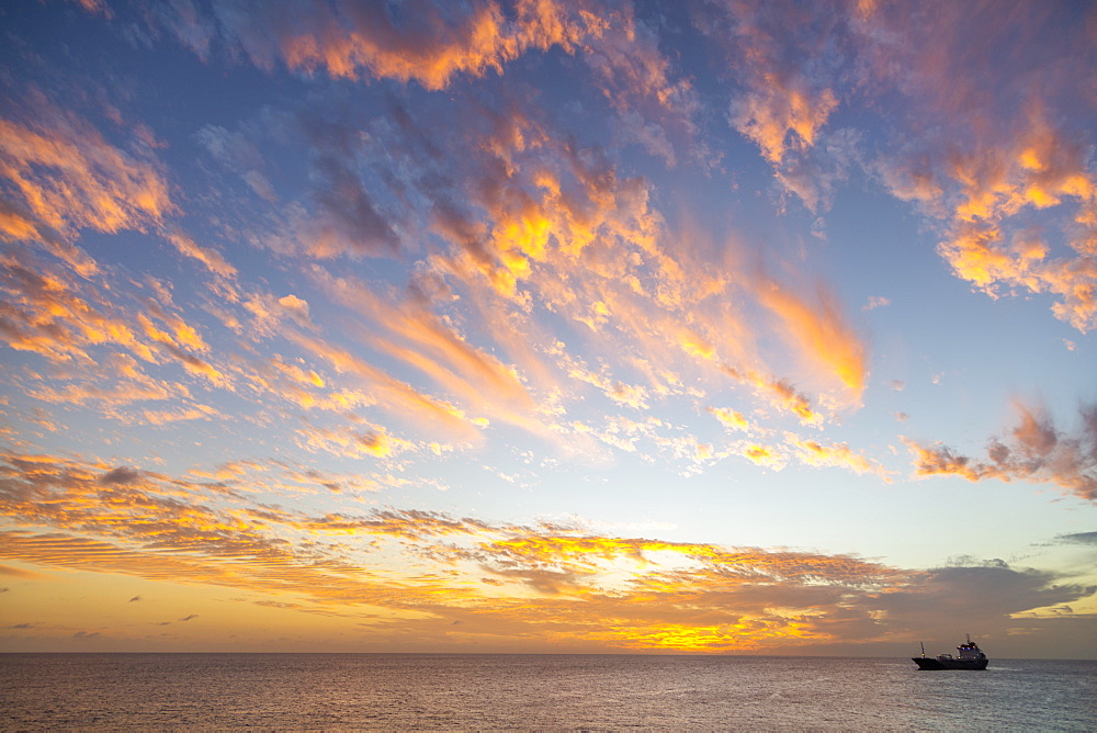 View of ship against West Coast sunset, Bridgetown, Barbados, West Indies, Caribbean, Central America