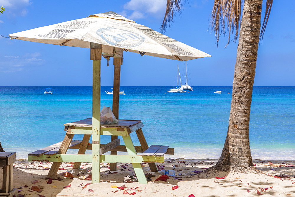 Boats afloat the Caribbean Sea viewed from the West Coast near Holetown, Barbados, West Indies, Caribbean, Central America