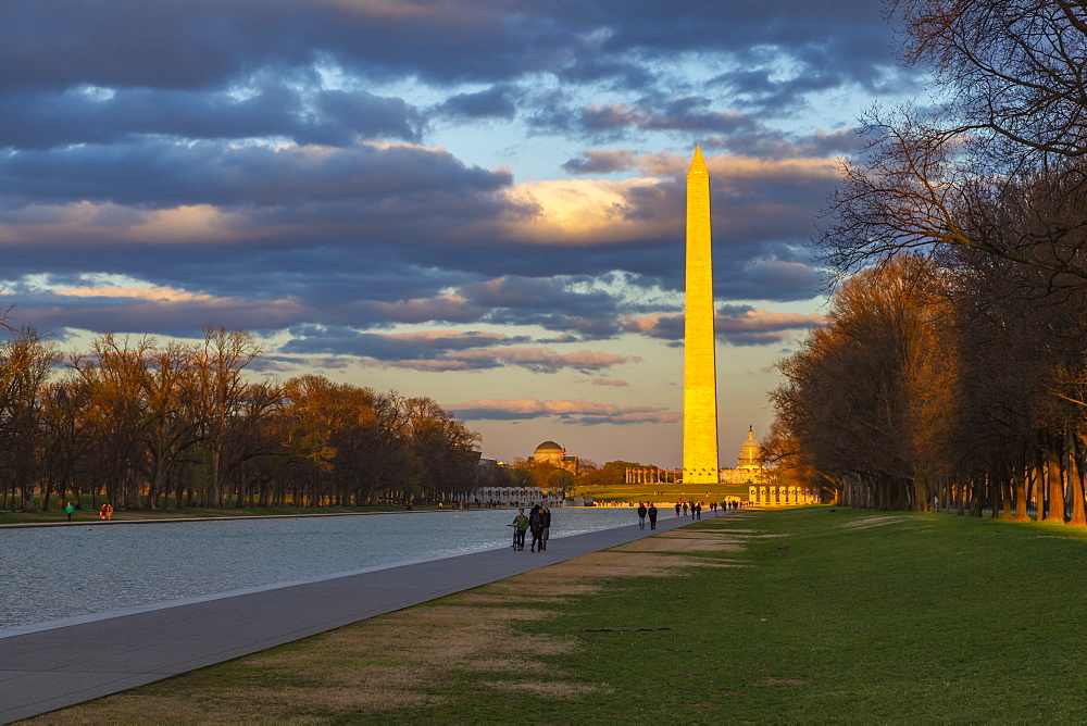 View of Lincoln Memorial Reflecting Pool and Washington Monument at sunset, Washington D.C., United States of America, North America