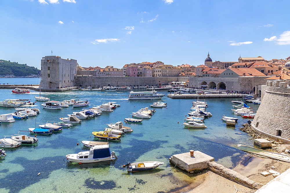 View of harbour, Dubrovnik Old Town, UNESCO World Heritage Site, and Adriatic Sea, Dubrovnik, Dalmatia, Croatia, Europe