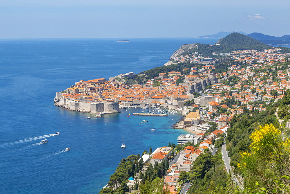 View of Old Walled City of Dubrovnik, UNESCO World Heritage Site, and Adriatic Sea from elevated position, Dubrovnik Riviera, Croatia, Europe